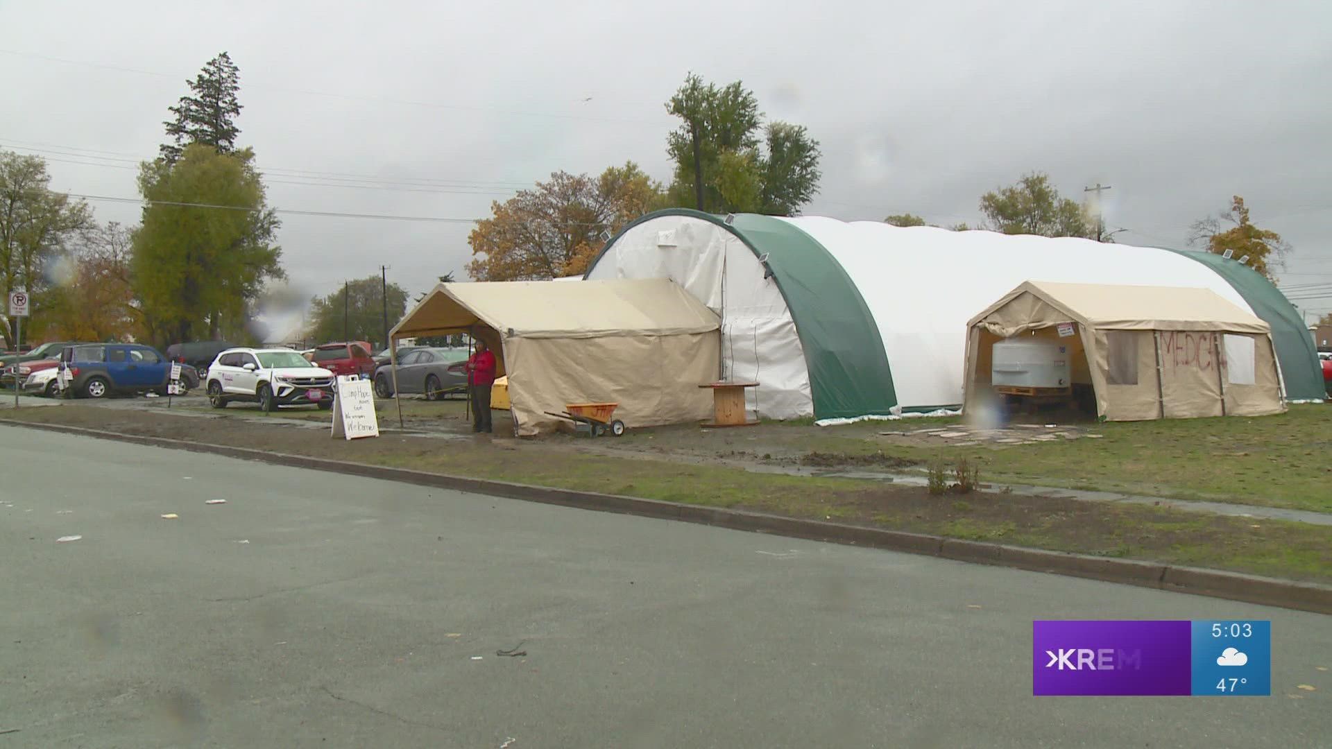 State agencies and local providers are focusing on ensuring people at the homeless camp near I-90 have what they need to be safe during the winter season.