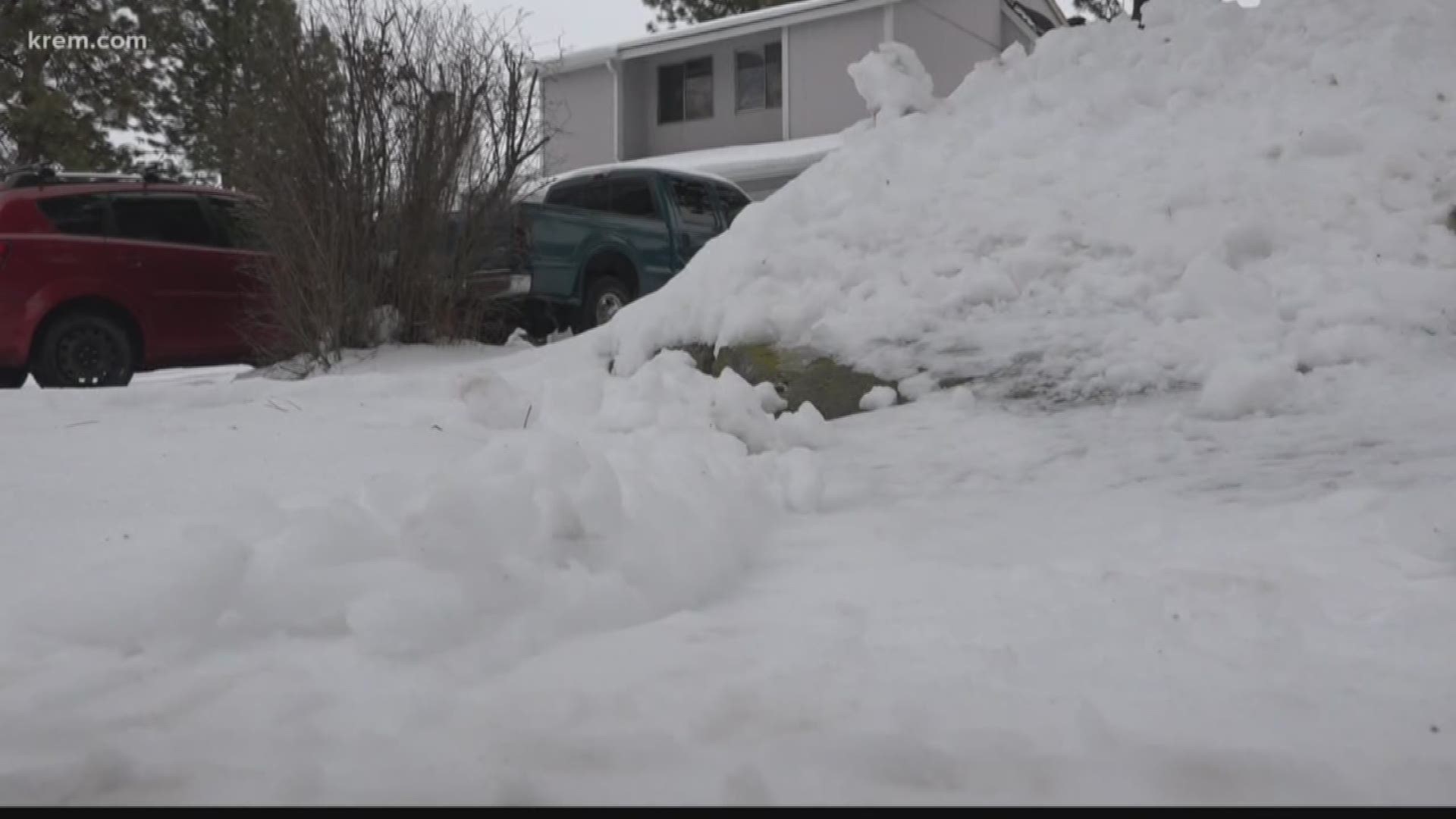 Two people in Spokane aren't seeing their street plowed because it lies between city and county plow routes. They are hoping to see home help before the next storm.