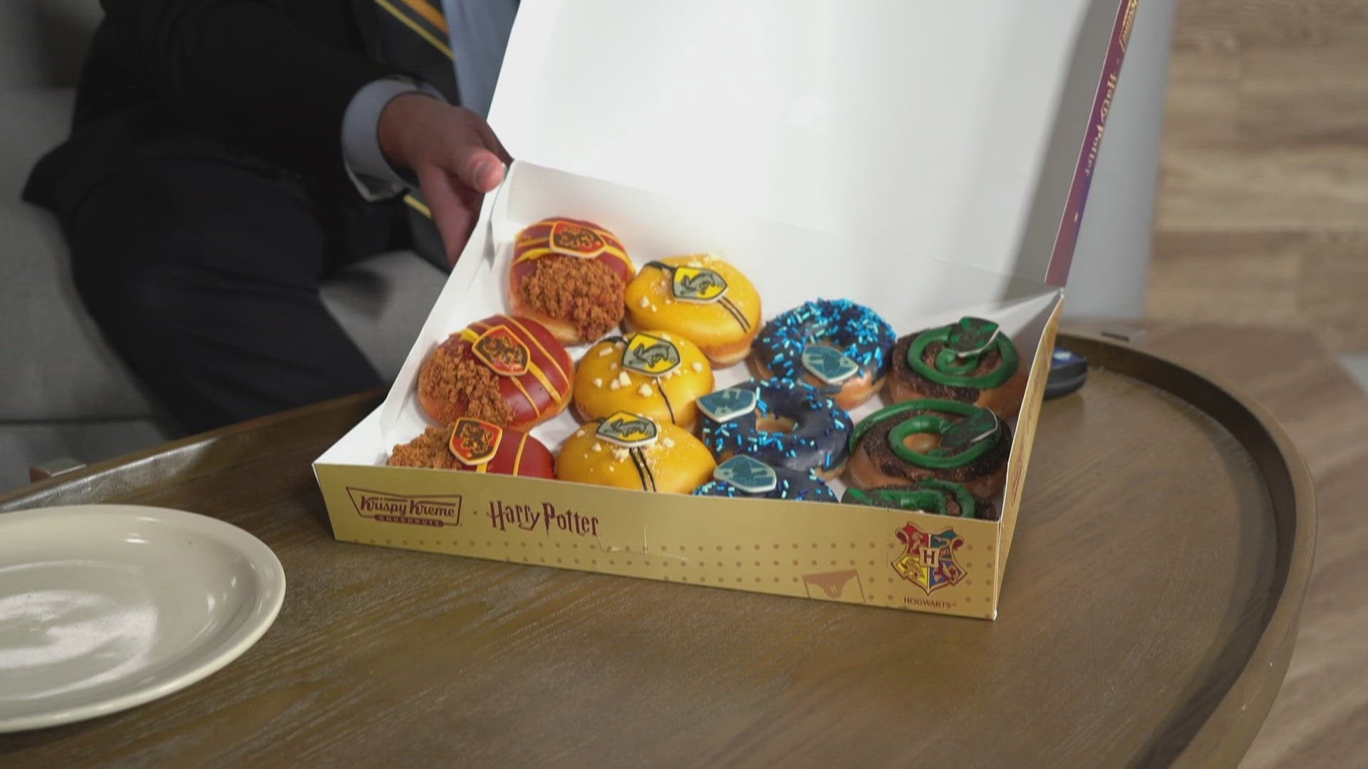 The enchanting collection includes a special "Sorting Hat" doughnut with a surprise filling representing one of the four Hogwarts houses.