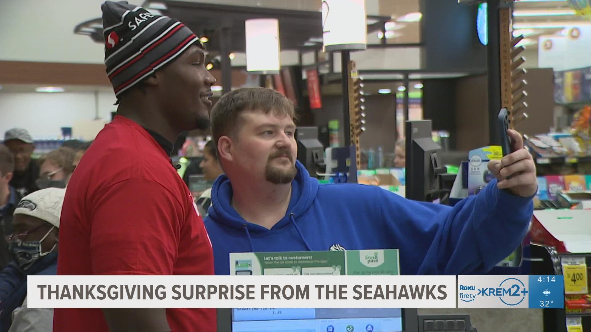 The Seahawks surprised every single customer for one hour. They signed autographs on the receipts.