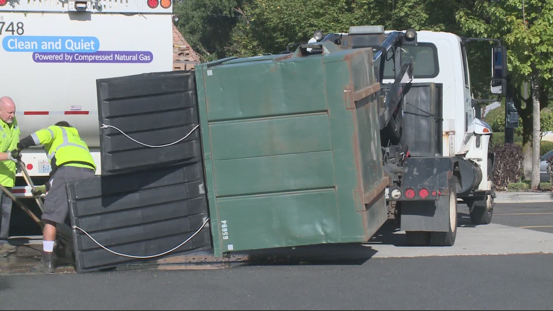 A garbage crew heard screaming coming from inside their truck while they were emptying dumpsters near the Olive Garden on North Newport Highway.