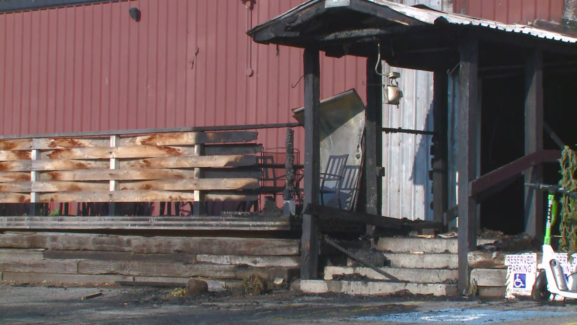 Investigators say a cigarette left in a wooden planter started a fire on the front patio.