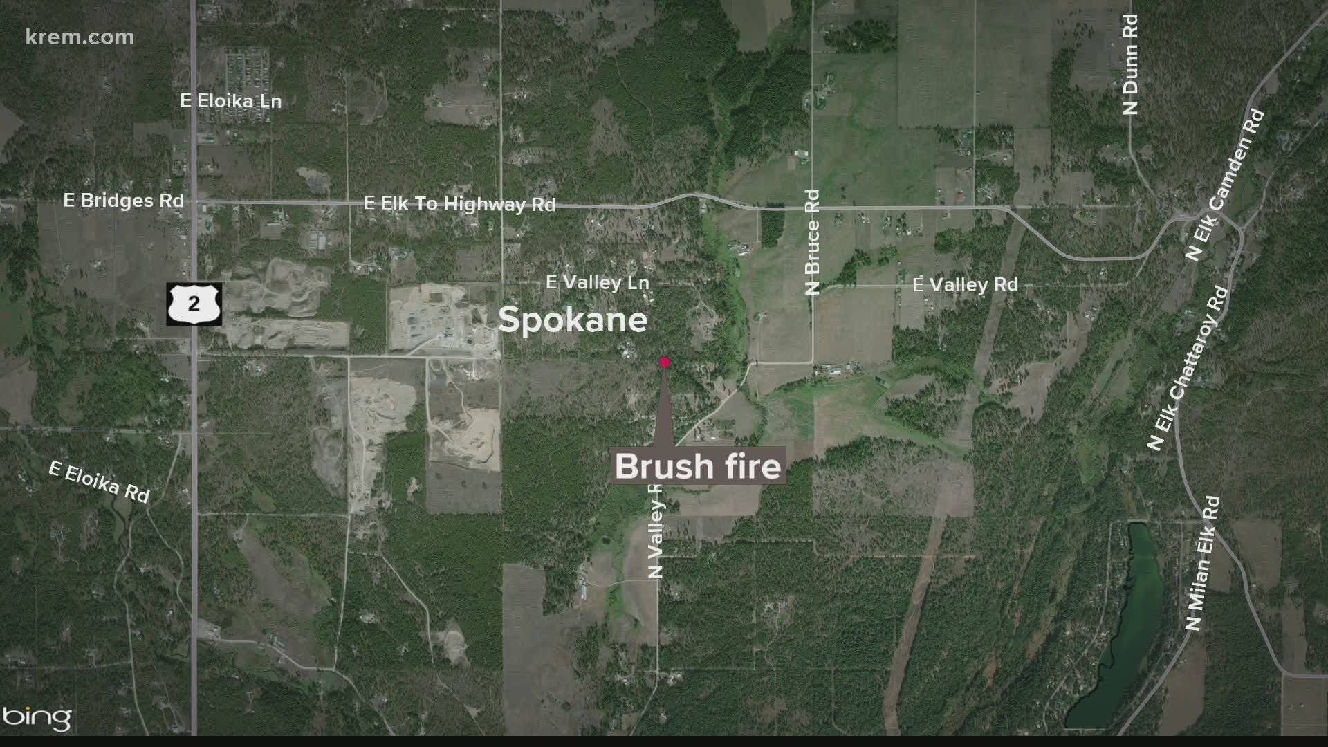 According to Washington DNR Ryan Rodruck, a brush fire near US Highway 2 in Elk, WA.