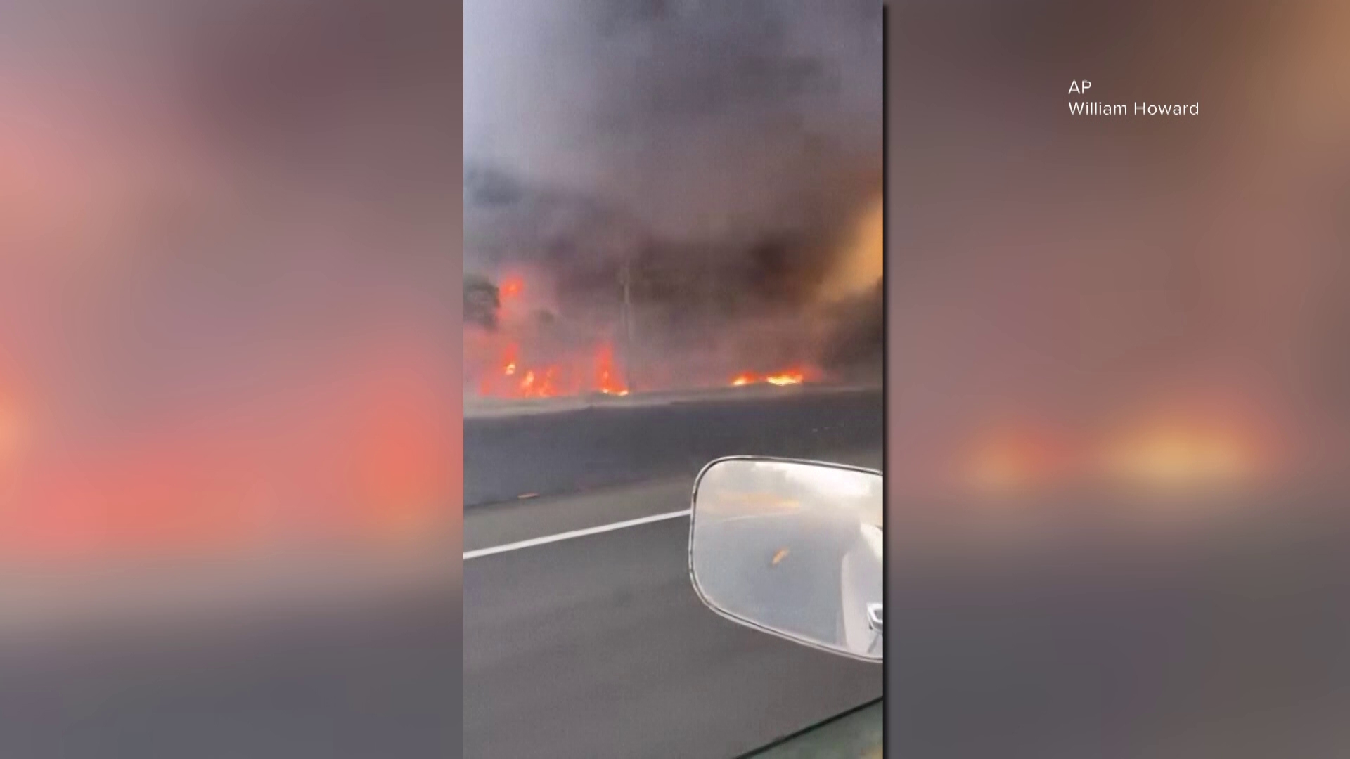 Video shows escape through flames and smoke as wildfire begins burning the outskirts of Idaho town