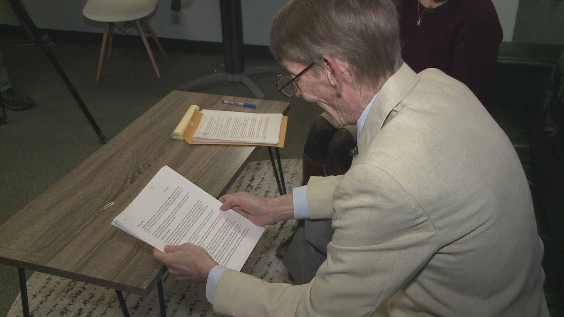 Steve Hanna reads the letter he sent to KREM asking for help after a credit card company declared him dead.
