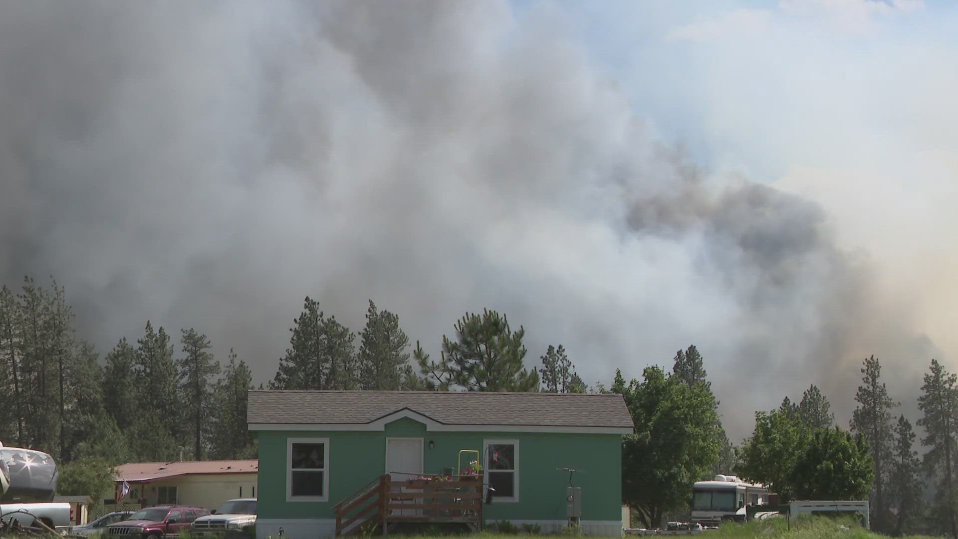 Spokane County firefighters are fighting a fire burning in the Geiger Heights area. Firefighters report the fire is threatening structures.