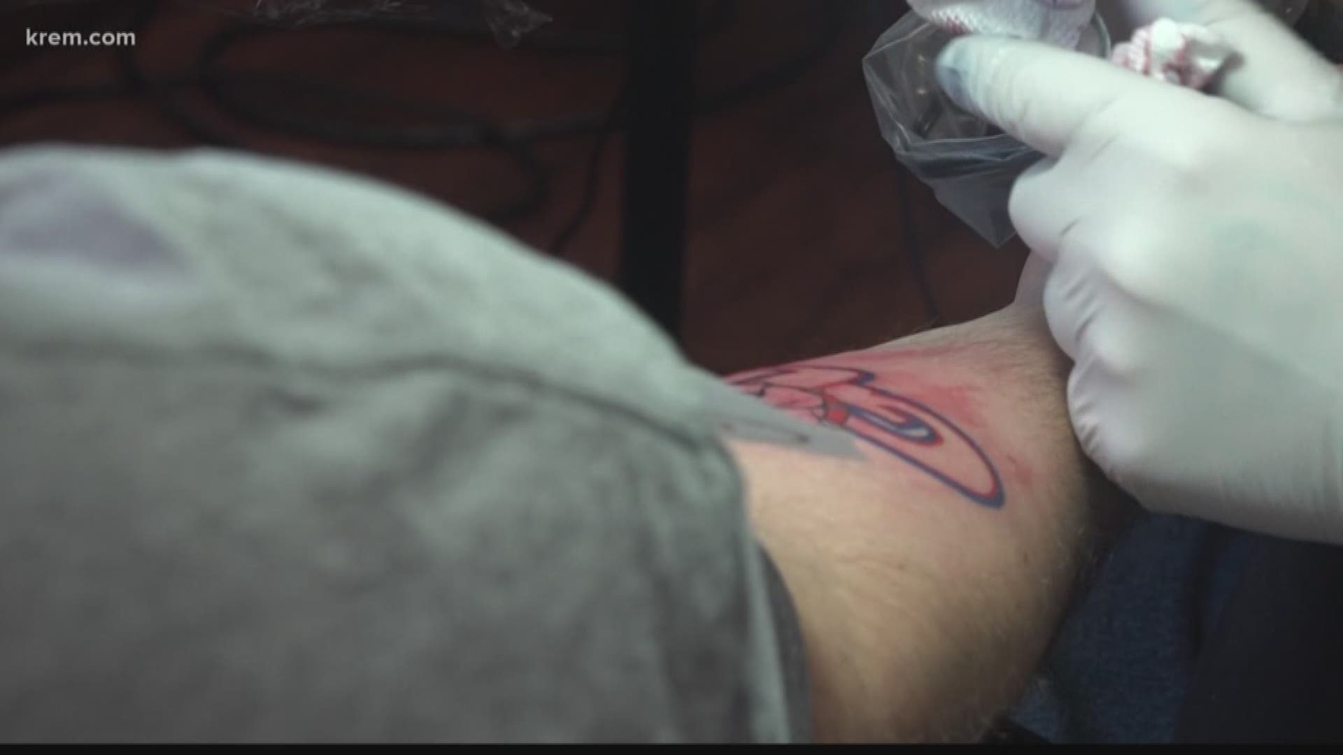 Local man helps the homeless with his first Zags tattoo (3-20-18)