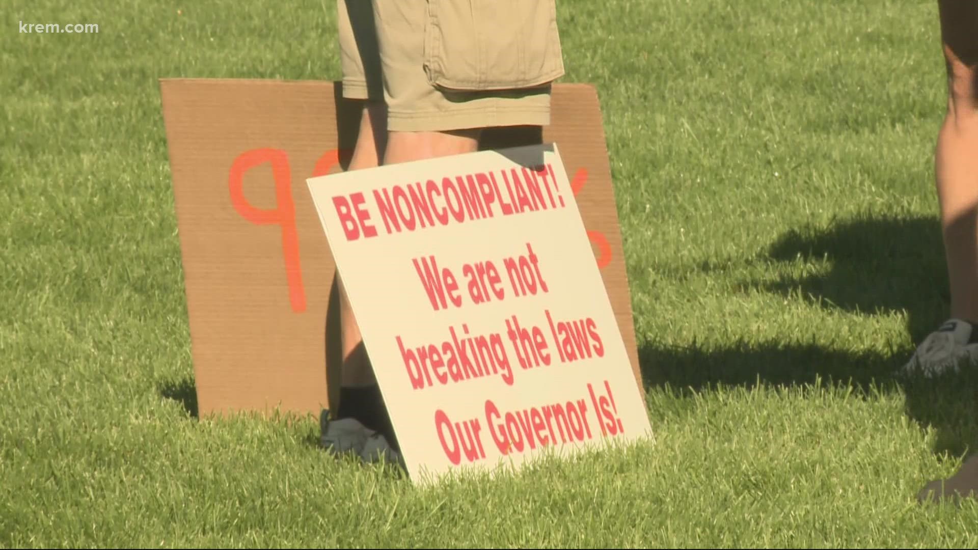 Protestors gather in Riverfront Park to protest mask mandate