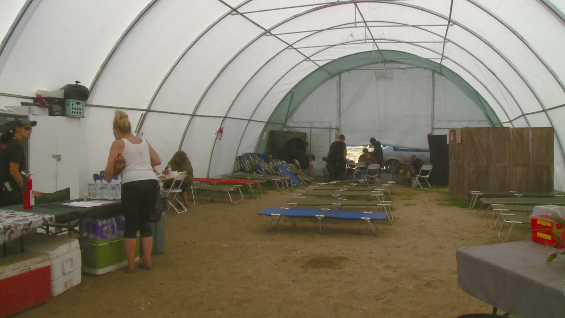The cooling tent was meant to go down a few weeks ago, but it still remains up. Now, the city is asking Jewel's Helping Hands to take it down, once more.