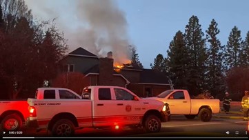 Spokane Valley firefighters battle house fire in a Northwood neighborhood