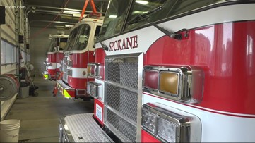 Firefighters investigating an attic fire caused by a Molotov cocktail in a Spokane empty house
