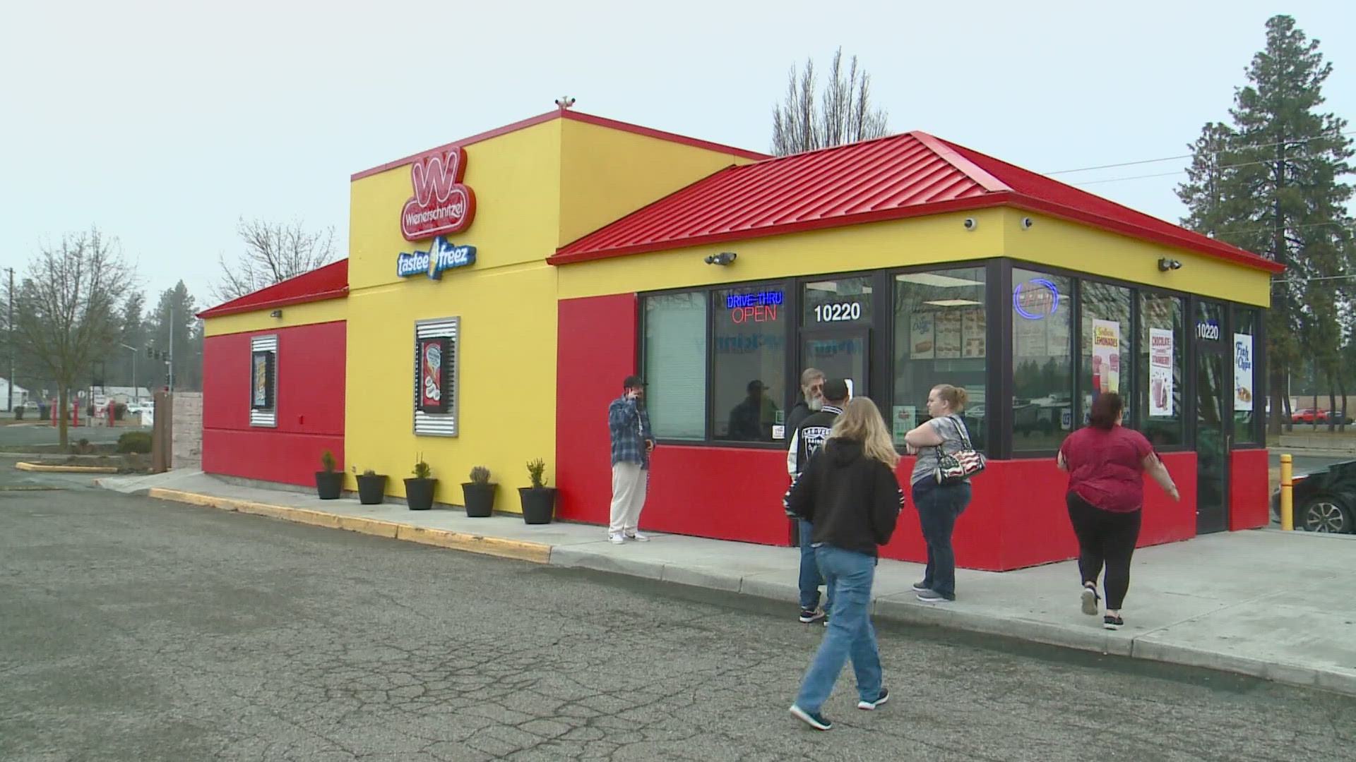 Lines extended around the block for the grand opening of the new Wienerschnitzel in North Spokane Friday.