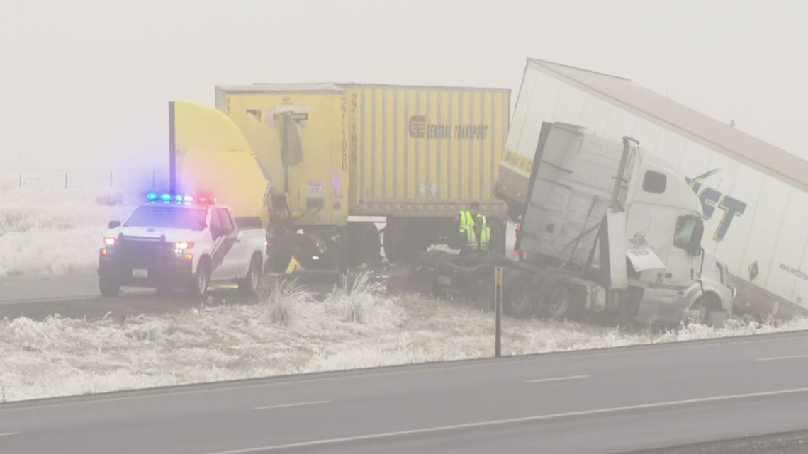 Icy roads cause several semis to crash prompting several lanes to be
