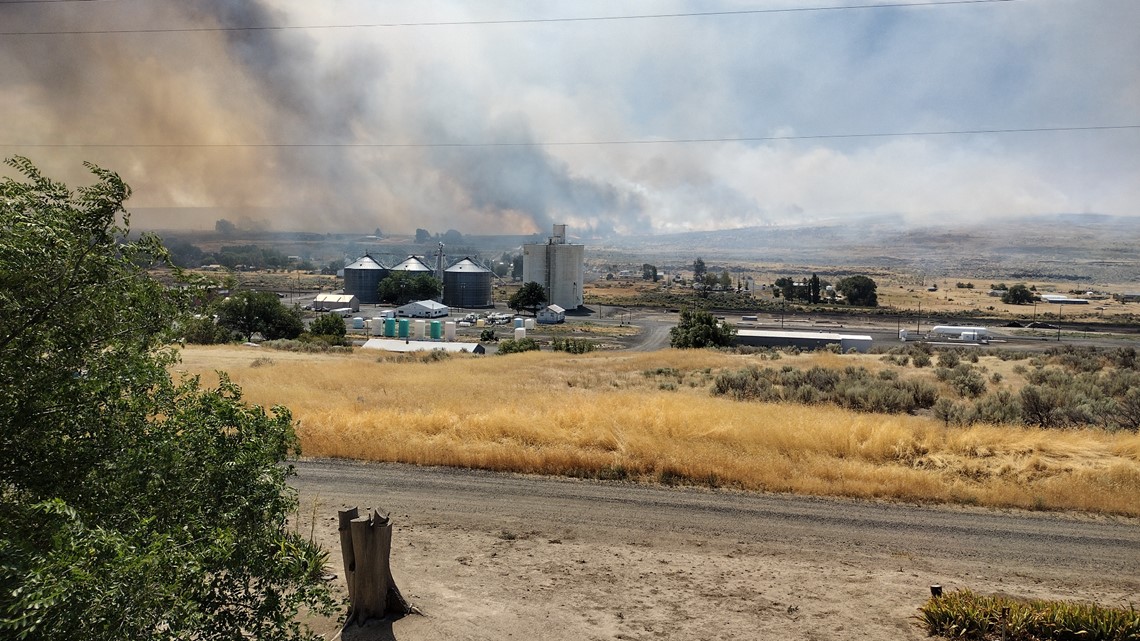 Growing wildfire causes entire town of Lind to be evacuated