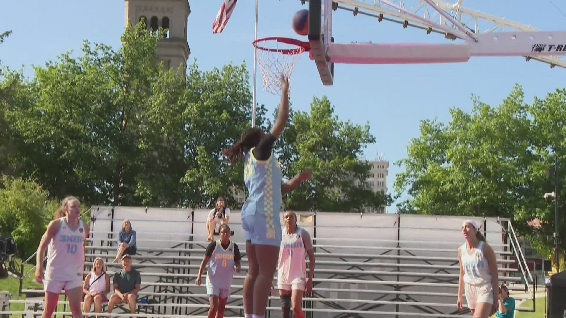 Eight teams of professional women's basketball players took to Center Court to kick off the Hoopfest festivities.