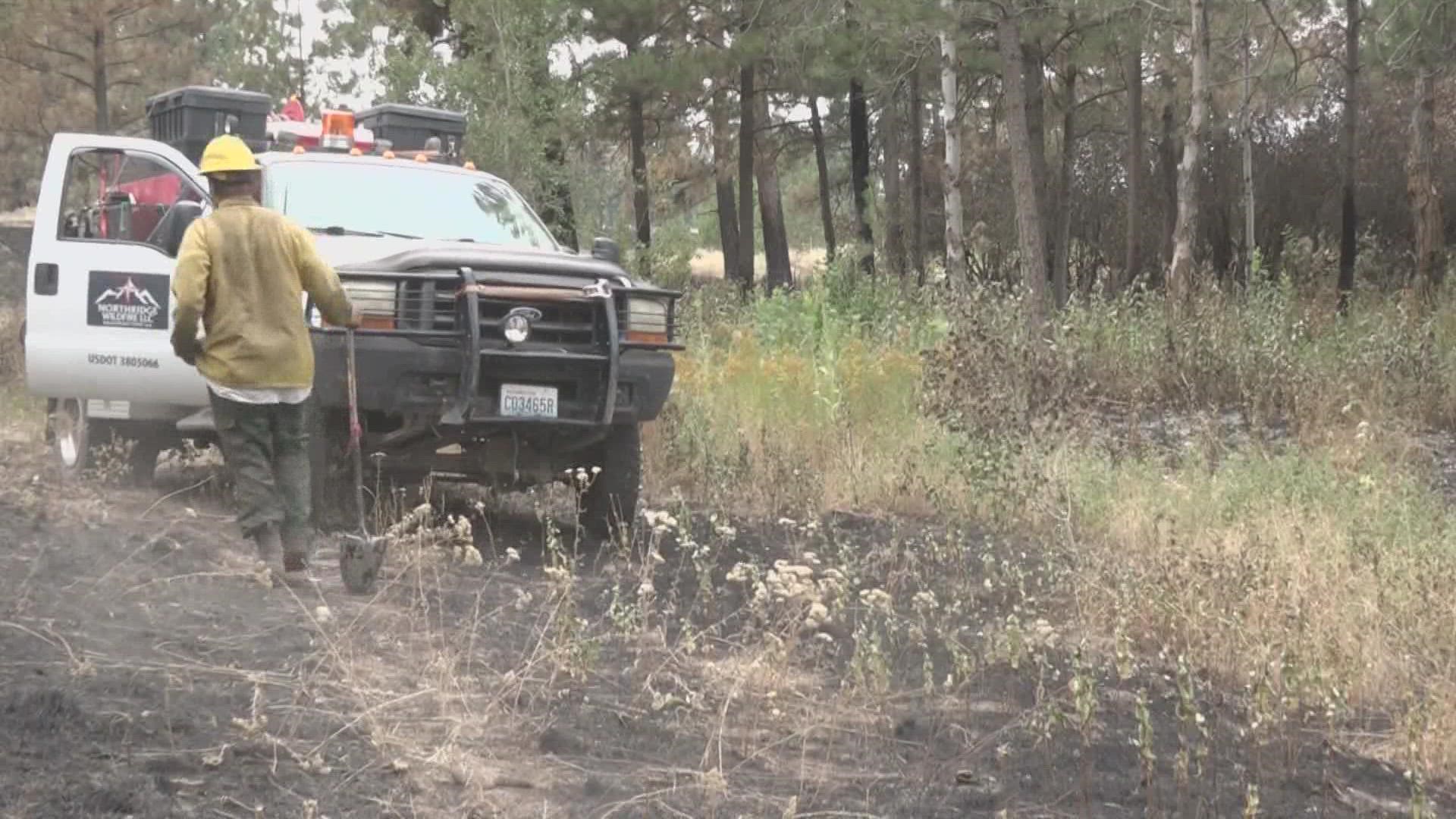 With another chance of a fire flaring up, local firemen are making sure hotspots are put out to stop another fire from flaring up.