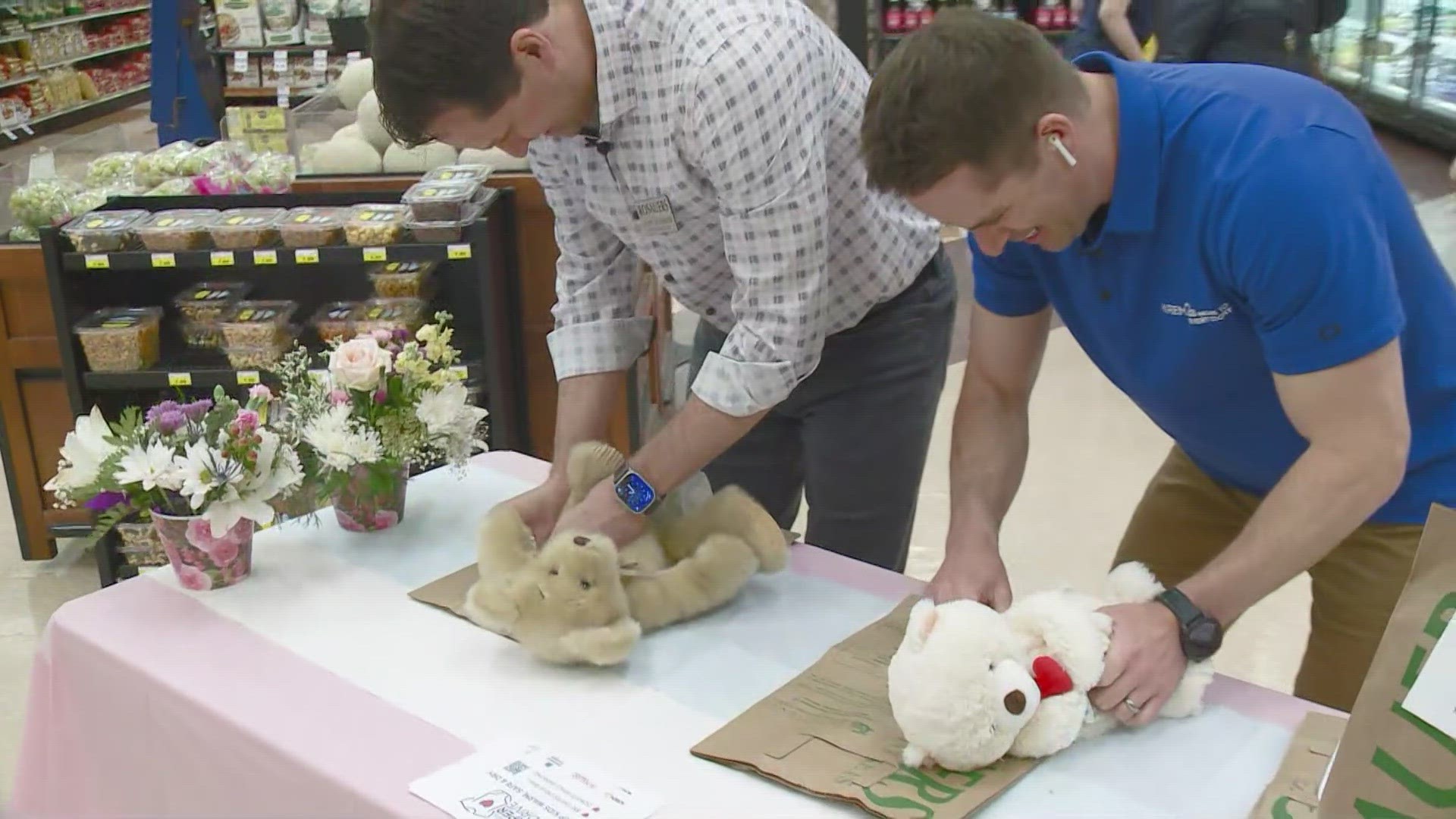 KREM 2's Mark Hanrahan competes in a diaper-changing competition with the President and CEO of Rosauers. The KREM Cares Diaper Drive is underway now.