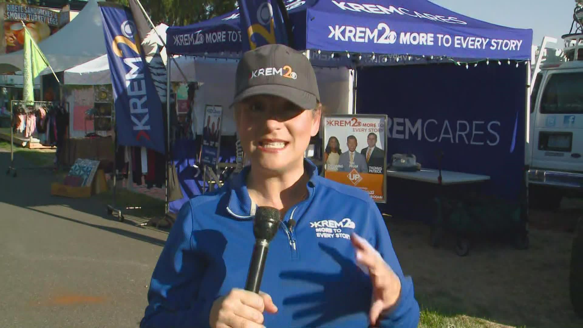 KREM 2's Laura Papetti shows off the KREM 2 booth as the first day of the fair approaches.