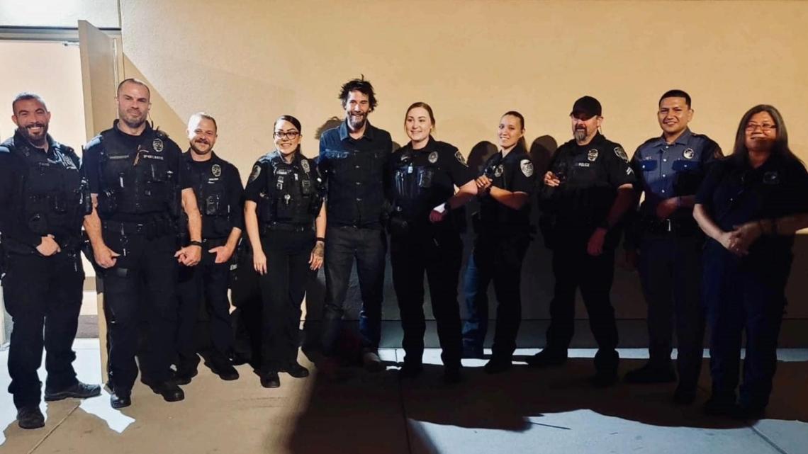 Keanu Reeves takes photo with Airway Heights Police Department | krem.com