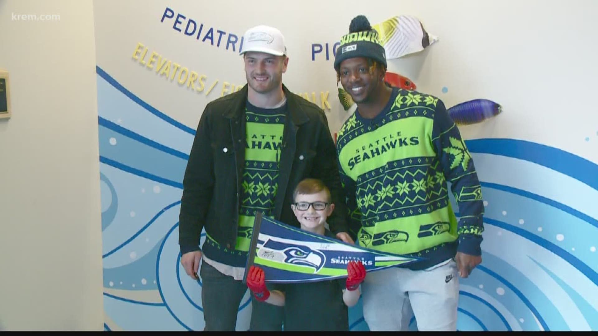 Seattle Seahawks players Jacob Hollister and Malik turner visited children at Spokane's Sacred Heart hospital. They got to meet some of their young fans.