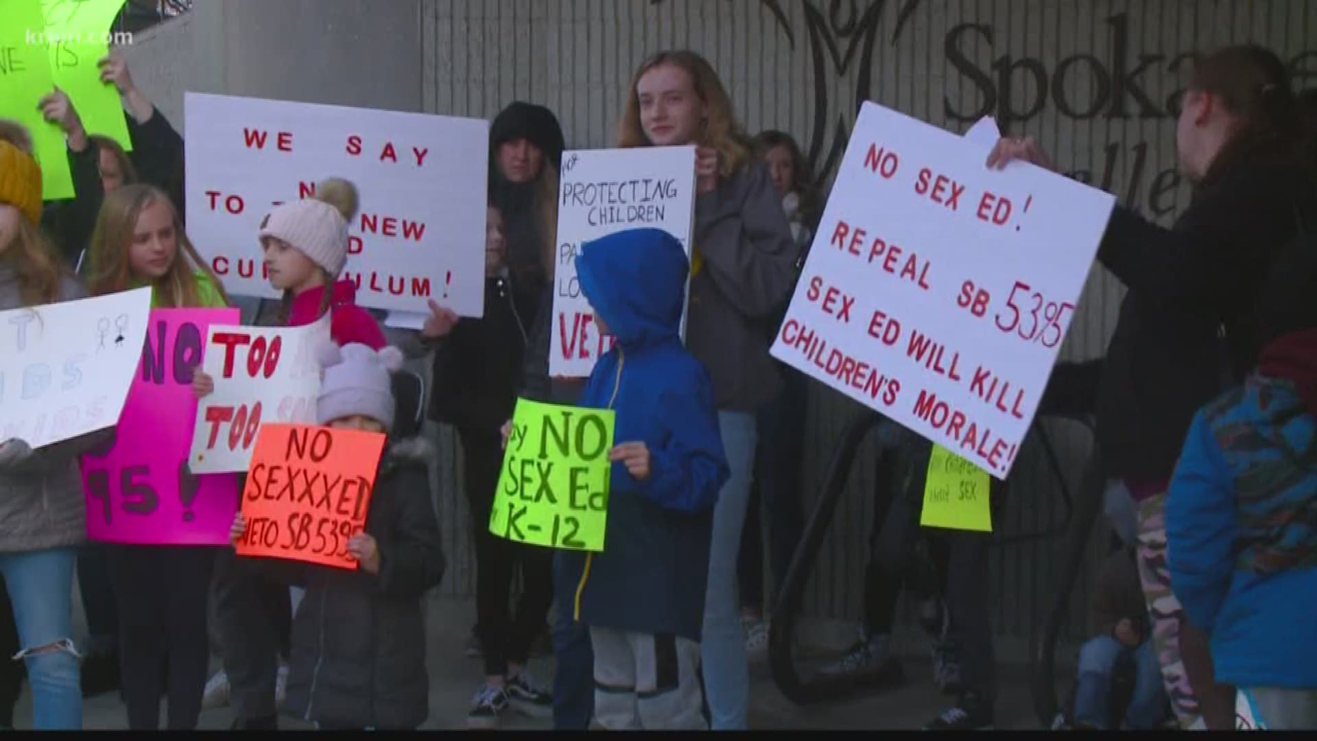 More than a hundred passionate parents stood outside of Spokane Public School's district office protesting a bill mandating sex education.