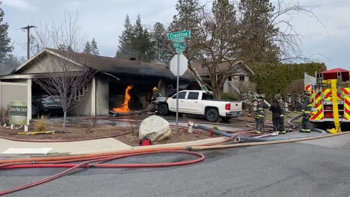 Spokane firefighters respond to a fire at South Hill home