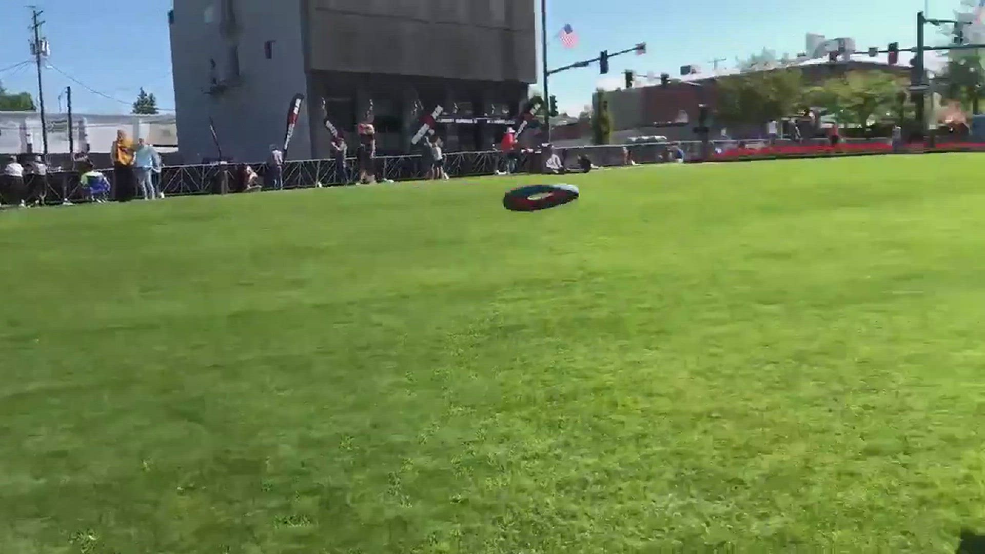 Noodle the dog catches frisbee during half-Ironman CDA