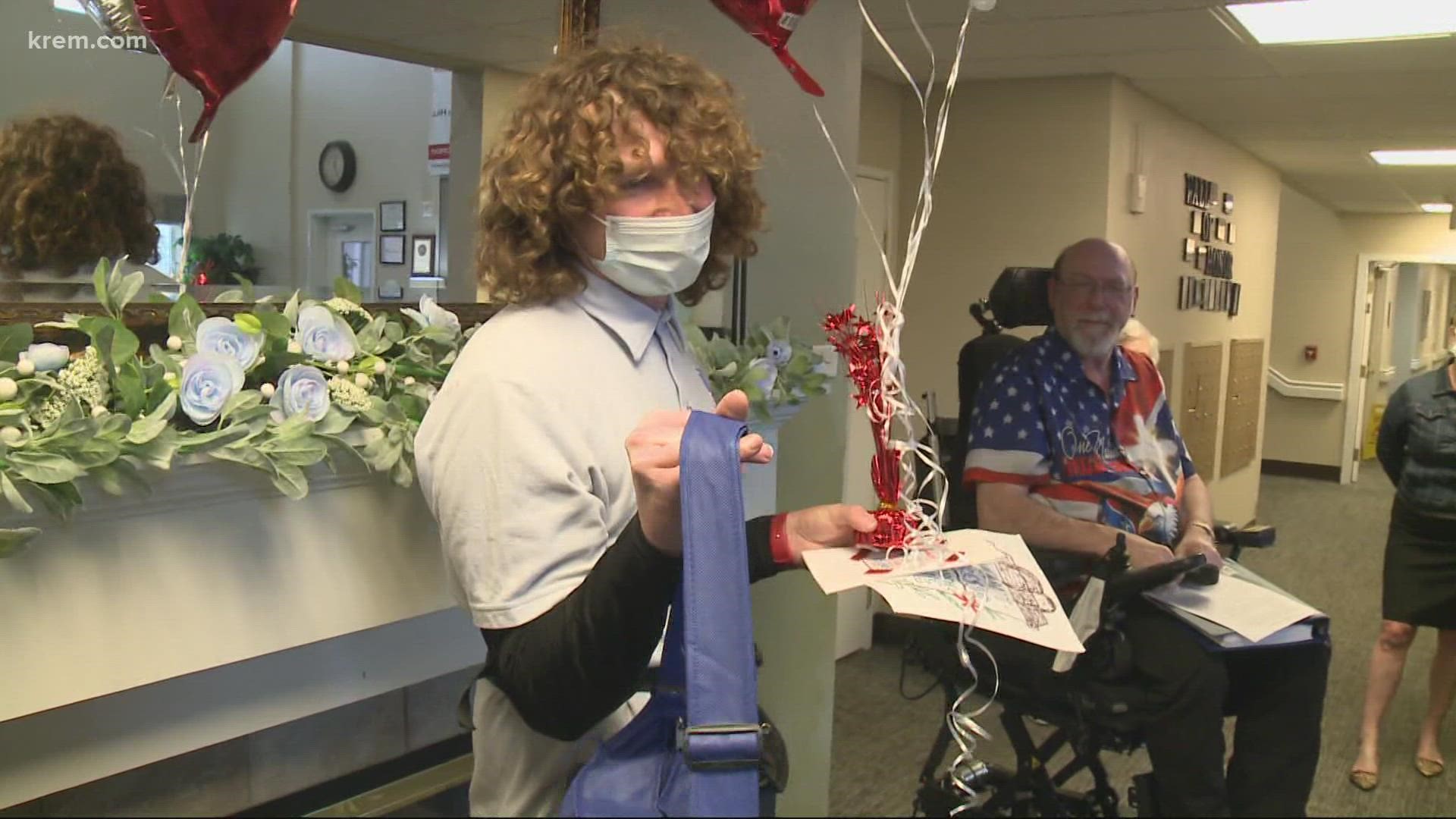 Residents at Avamere on the South Hill greeted their loyal mail carrier, Koby, with cheers and gifts for bringing them mail throughout the pandemic.