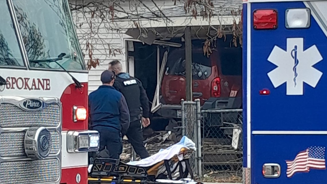 Driver injured after crashing car into home in North Spokane | krem.com
