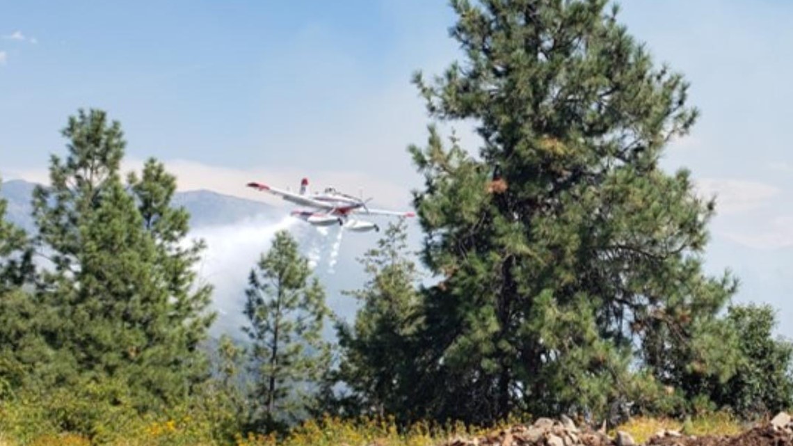 Fire crews fighting Moyie Fire burning near mill, homes in Boundary