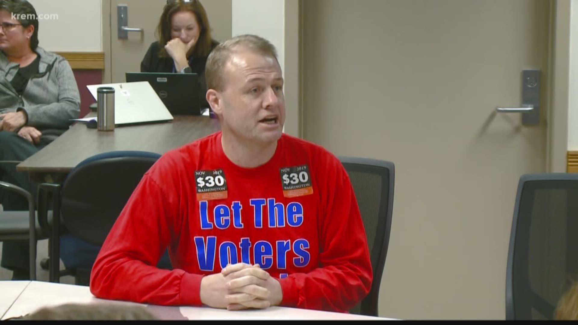 Political activist Tim Eyman interrupted a Spokane city committee meeting to comment on a potential resolution opposing state measure I-976, which he proposed.