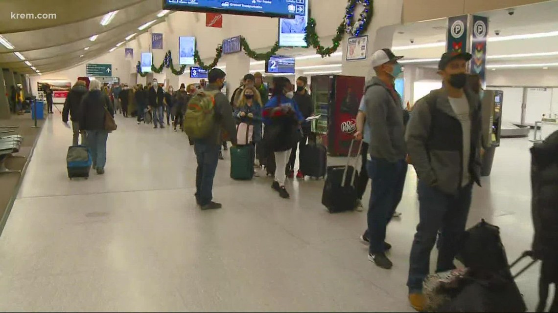 Passengers encounter long airport security lines at Spokane Airport ...