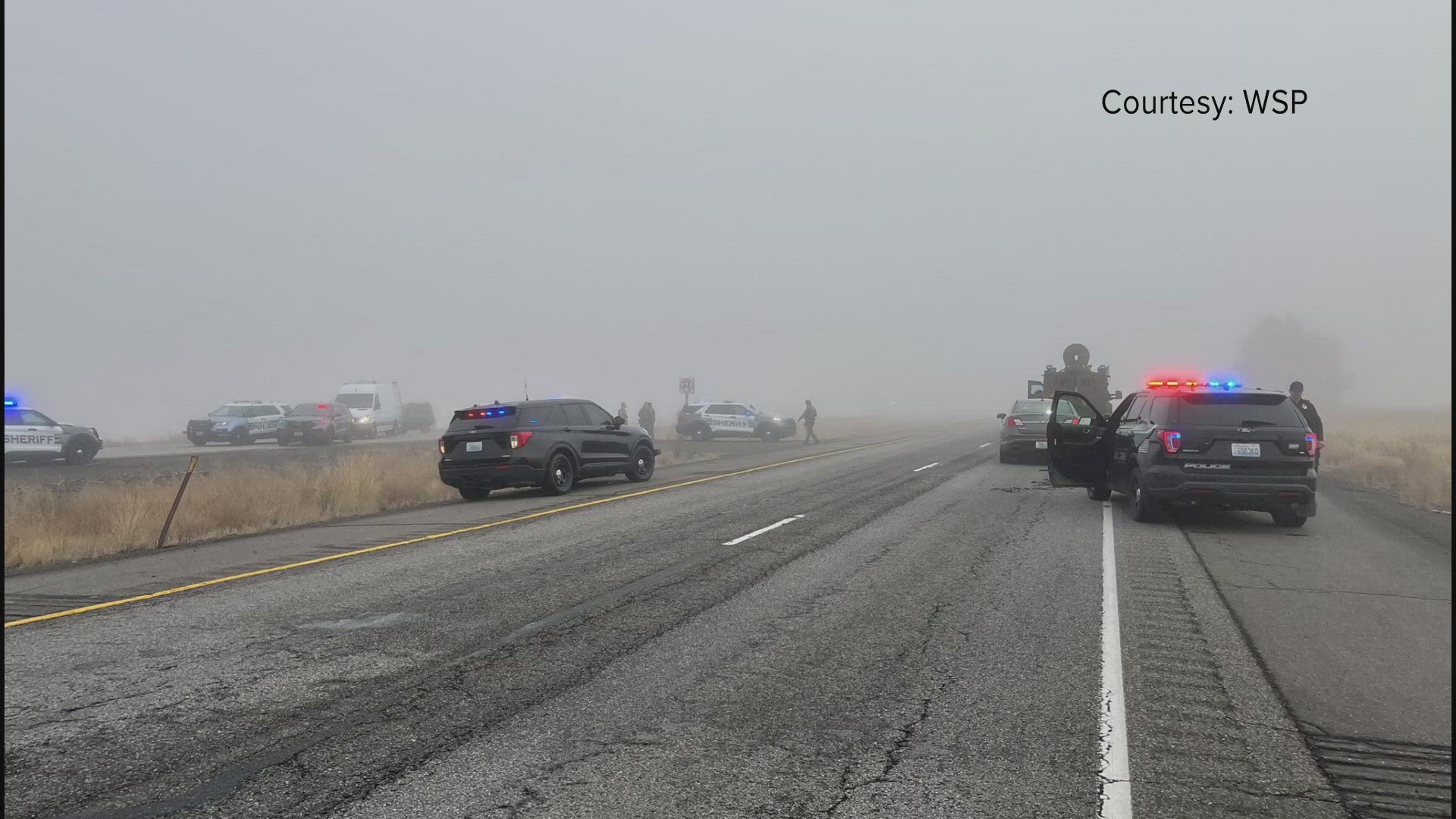 Washington State Patrol says troopers stopped a car and determined it was stolen and the driver has refused to leave the vehicle.