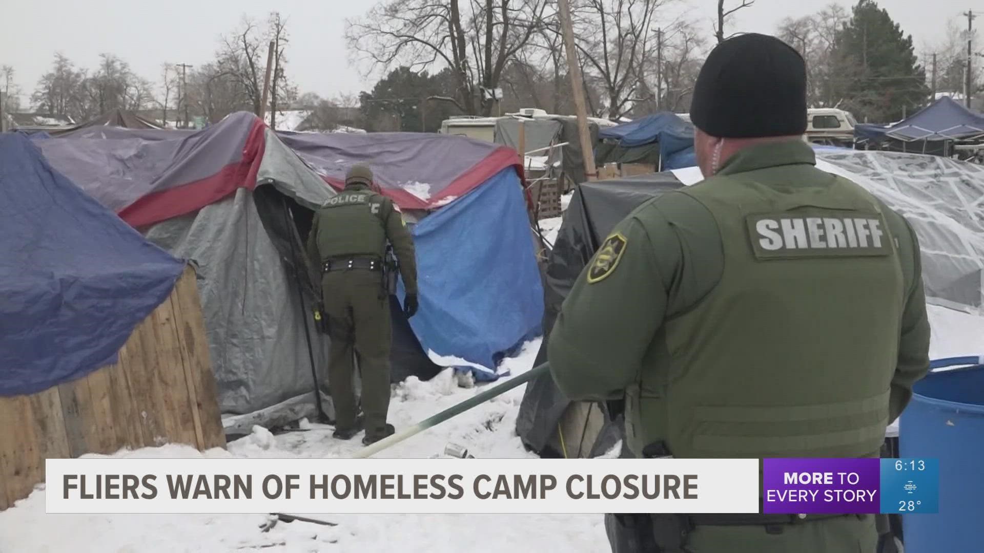 Providers say that people living at the camp already have the information in these flyers and that bringing people in uniform to distribute them is a scare tactic.