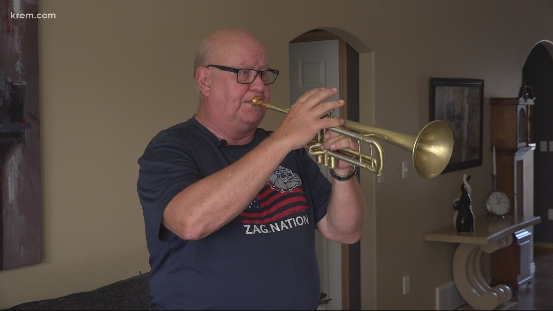 Larry Jess, the Principal Trumpet player in the Spokane Symphony, played 'Taps' at 3 p.m. as part of Taps Across America.