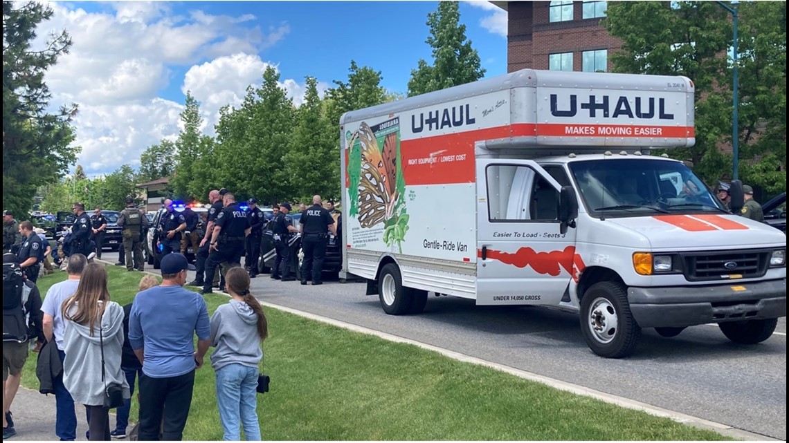 Police arrest 31 people with ties to hate group, found in U-haul | krem.com