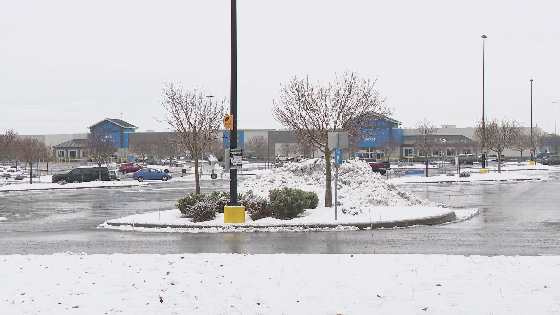 Police continue to investigate a shooting at a Walmart in North Spokane that left a shoplifting suspect dead and two officers injured.