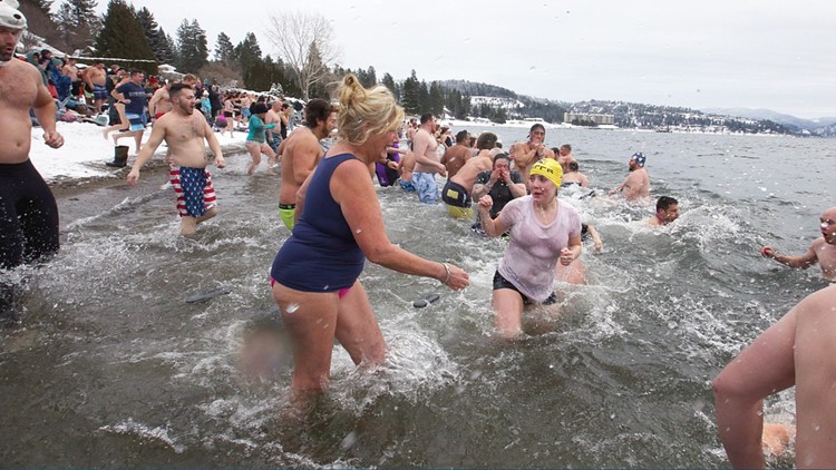 'It was way colder on the beach than it was in the water': hundreds jump into Lake Coeur d'Alene for New Year's Day annual Polar Bear Plunge