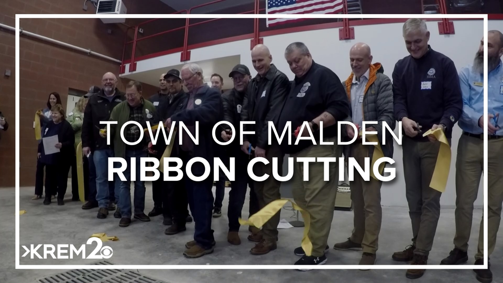 The new municipal building, after several cheerful cuts to the ribbon, will house Malden's fire station, town hall and post office.