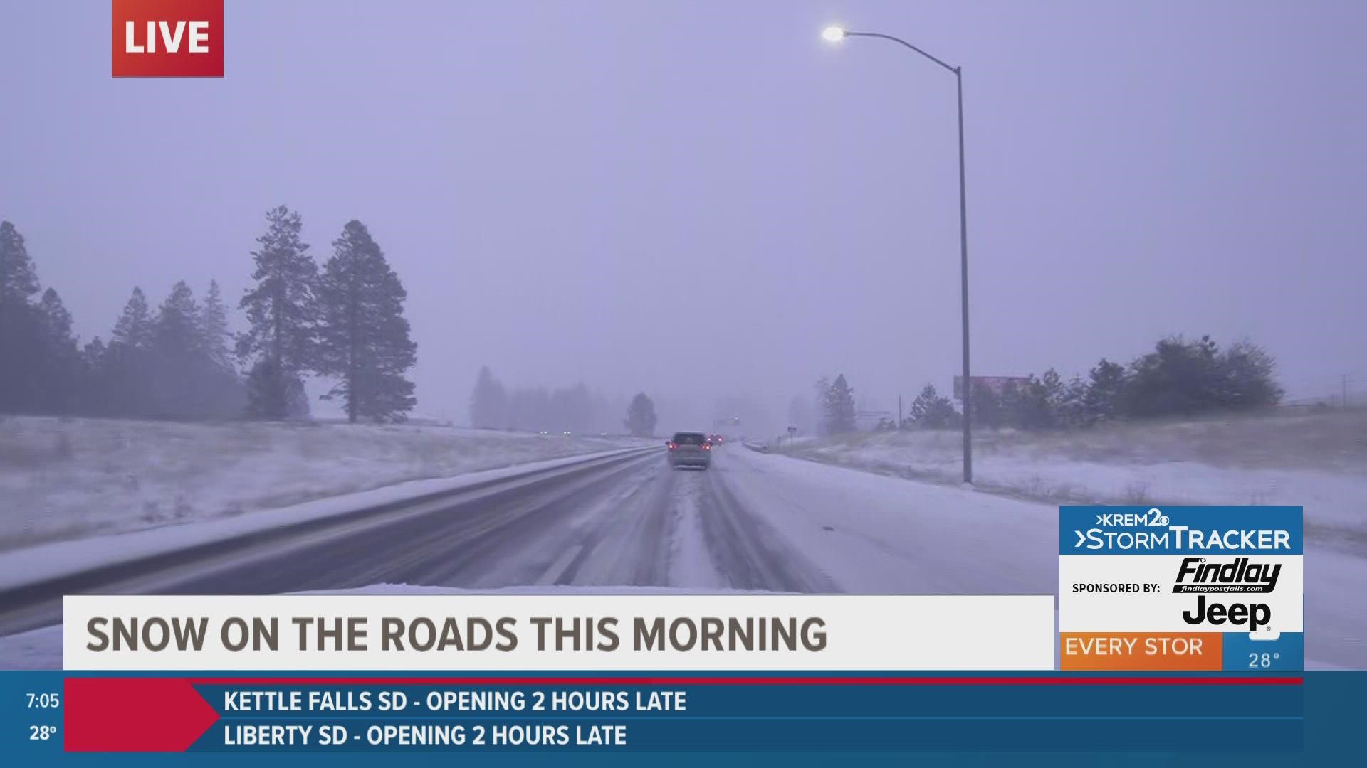 Snow is slowing down drivers on I-90 across Spokane and Coeur d'Alene on Monday morning.