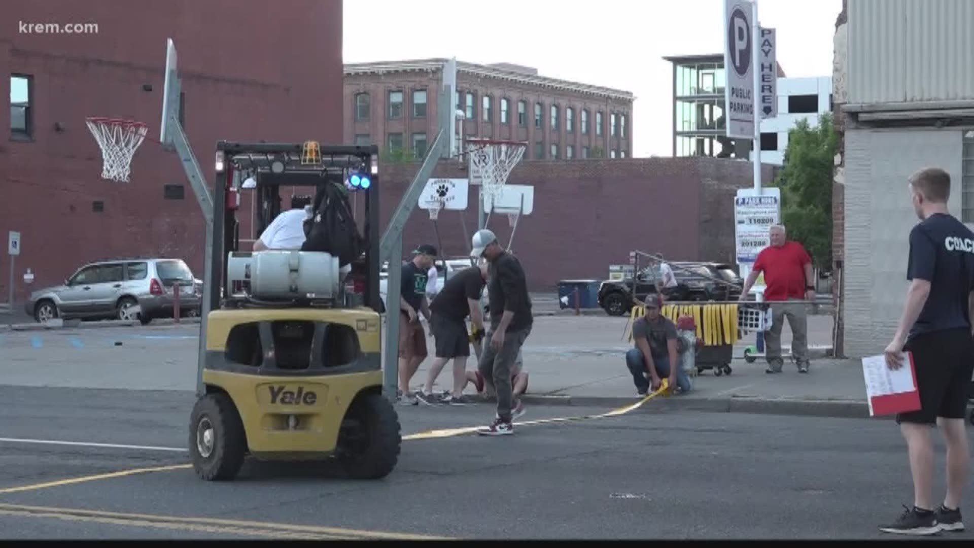 KREM's Casey Decker met with volunteers that transform Spokane into a basketball mecca for Hoopfest.