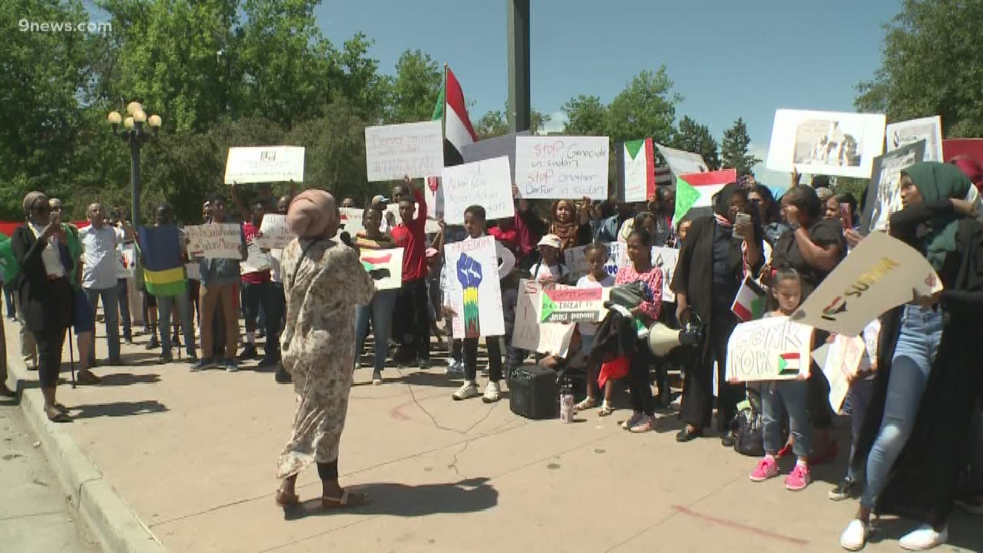 "We are the people of Sudan," chanted dozens of people in Denver's Civic Center Park.