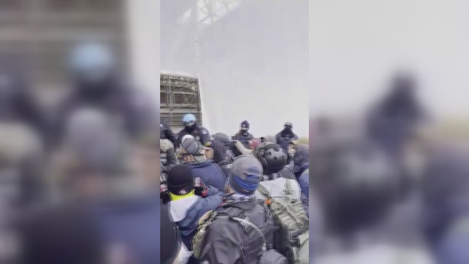 New video released by the DOJ shows a group of Capitol rioters, including several Proud Boys, charging police on January 6, 2021.